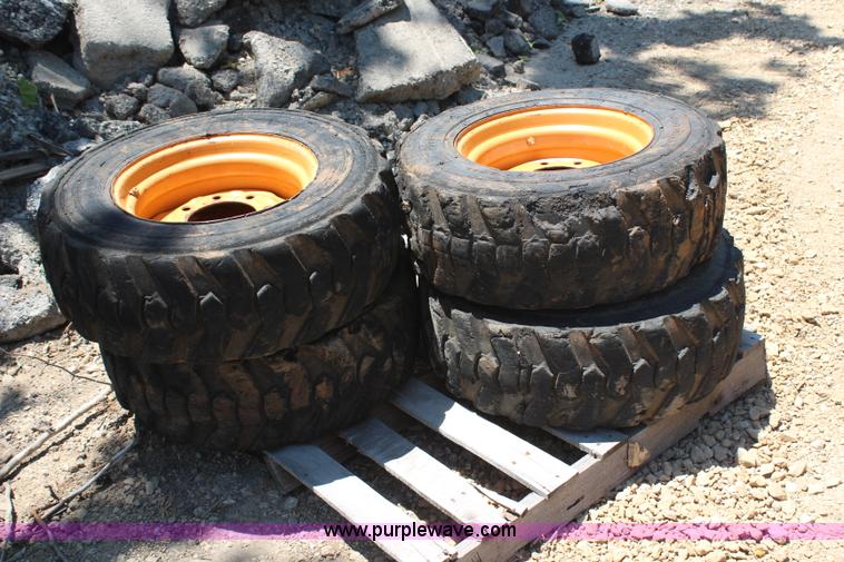 image for item X9303 (4) 10-16.5 foam-filled skid steer tires