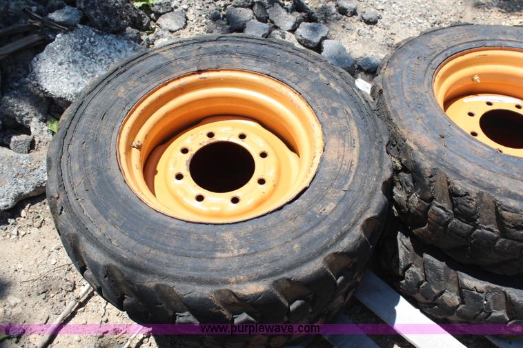 image for item X9303 (4) 10-16.5 foam-filled skid steer tires