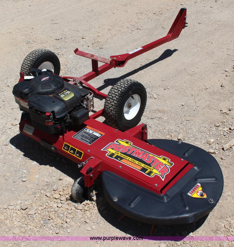 Postmaster tow mower and fence post trimmer in Lawrence, KS Item
