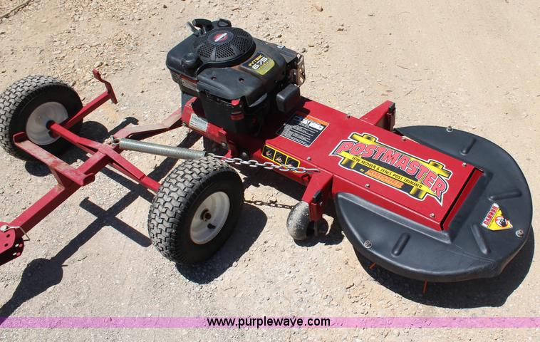 image for item X9305 Postmaster tow mower and fence post trimmer