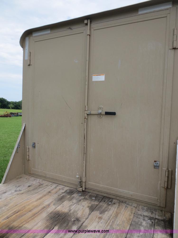 image for item B8146 2009 Circle D multi-purpose gooseneck flatbed trailer