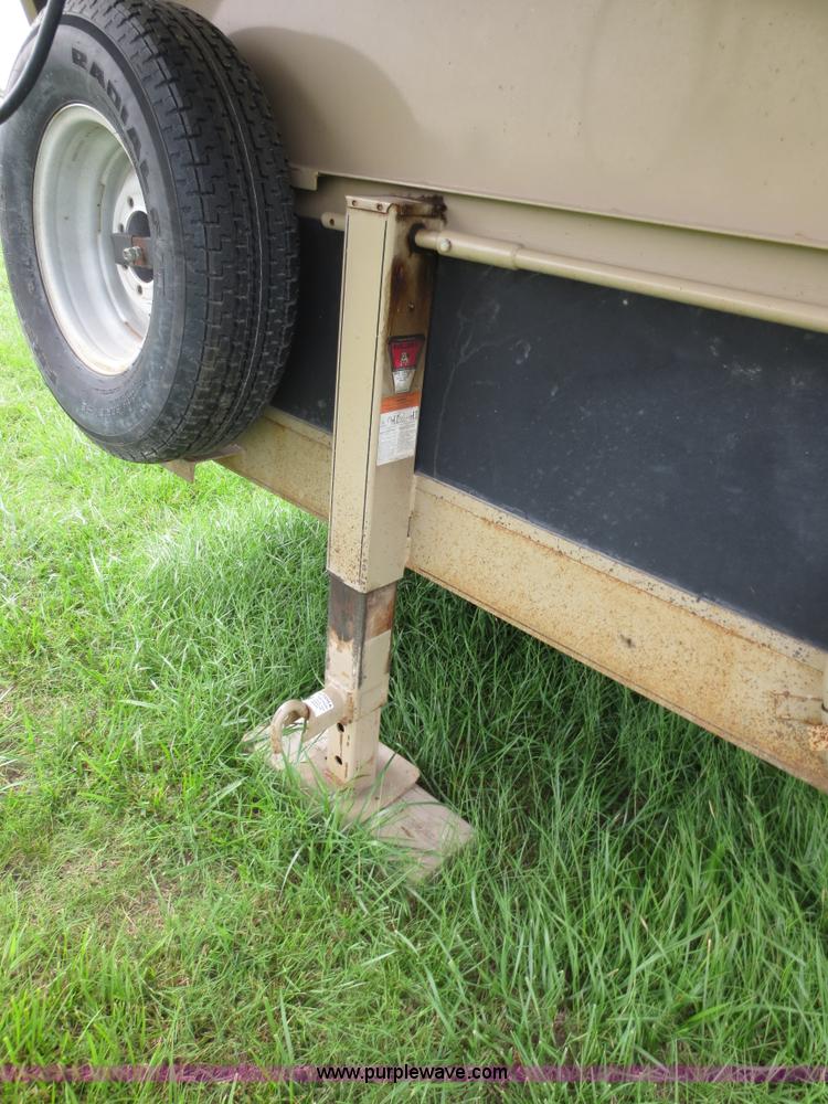 image for item B8146 2009 Circle D multi-purpose gooseneck flatbed trailer