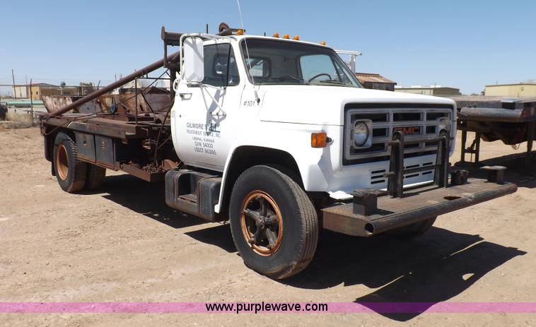 image for item F8729 1984 GMC TopKick oilfield truck