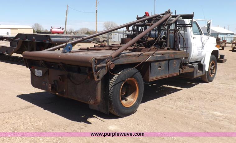 image for item F8729 1984 GMC TopKick oilfield truck