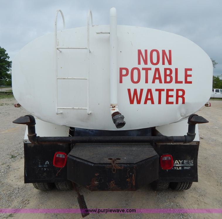 image for item G3202 1990 Ford F800 water truck