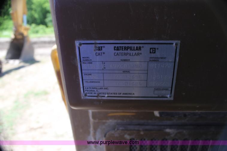 image for item H7464 2000 Caterpillar 615C Series II paddle scraper