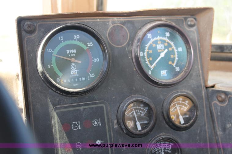 image for item H7464 2000 Caterpillar 615C Series II paddle scraper