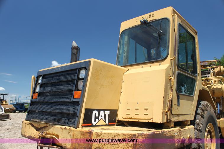 image for item H7464 2000 Caterpillar 615C Series II paddle scraper