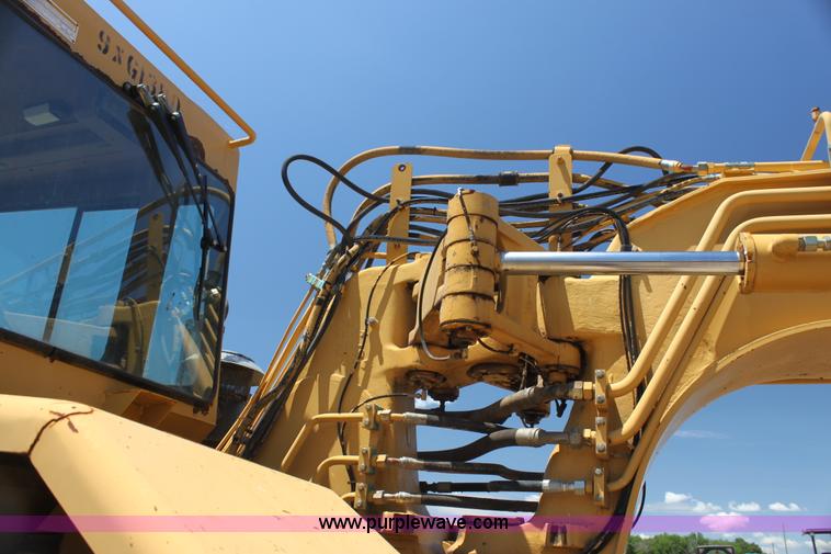 image for item H7464 2000 Caterpillar 615C Series II paddle scraper