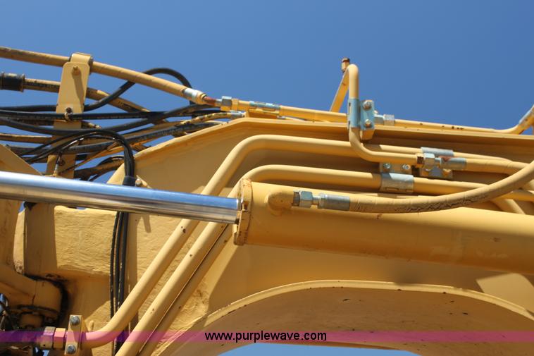 image for item H7464 2000 Caterpillar 615C Series II paddle scraper