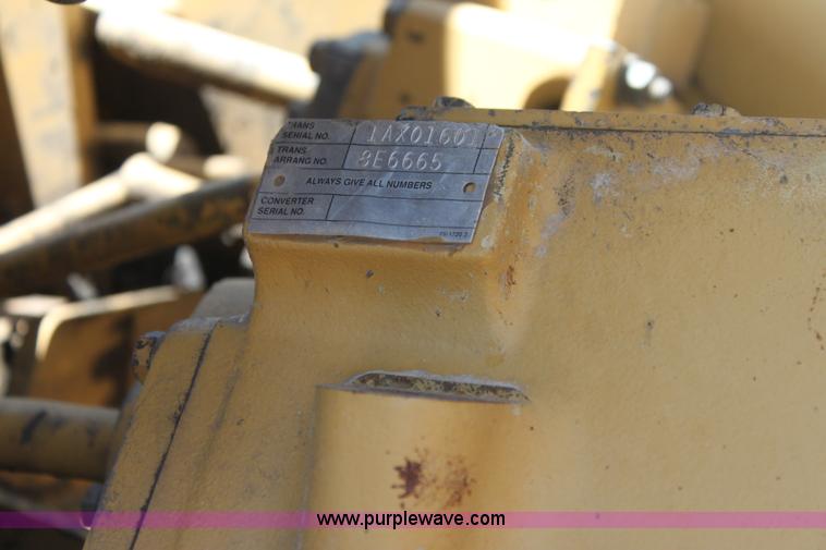 image for item H7464 2000 Caterpillar 615C Series II paddle scraper