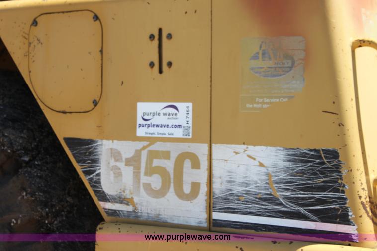 image for item H7464 2000 Caterpillar 615C Series II paddle scraper