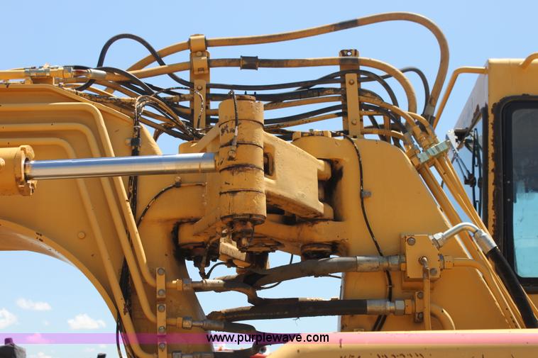 image for item H7464 2000 Caterpillar 615C Series II paddle scraper