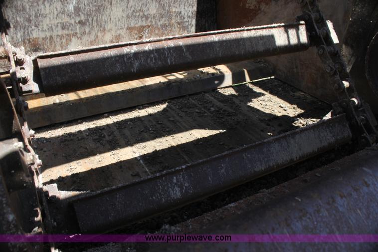 image for item H7464 2000 Caterpillar 615C Series II paddle scraper