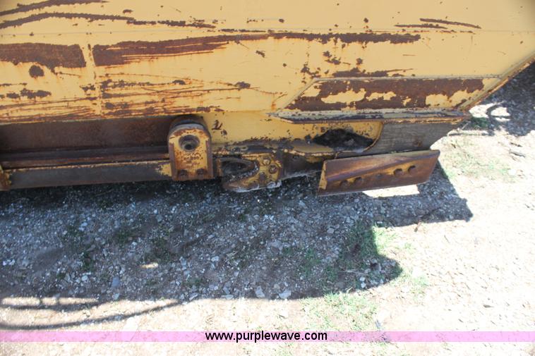 image for item H7464 2000 Caterpillar 615C Series II paddle scraper