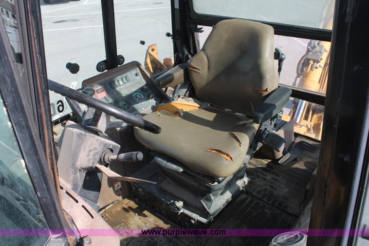 image for item I7989 1999 John Deere 310SE backhoe