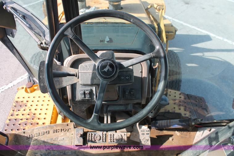 image for item I7989 1999 John Deere 310SE backhoe
