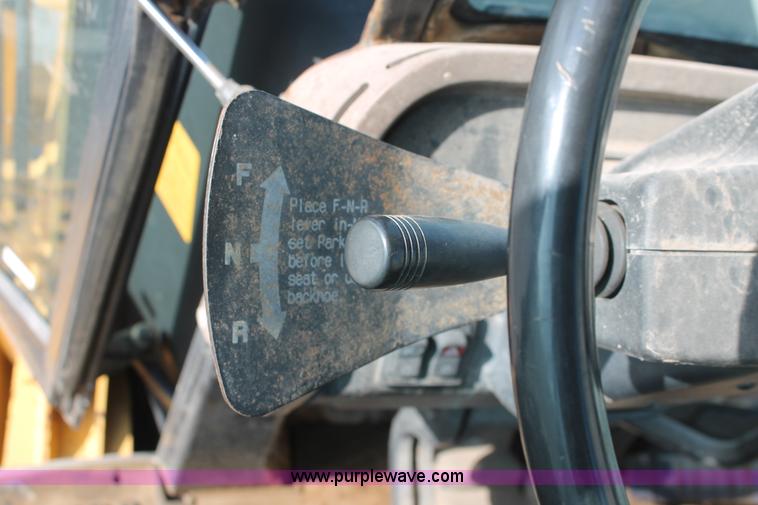 image for item I7989 1999 John Deere 310SE backhoe