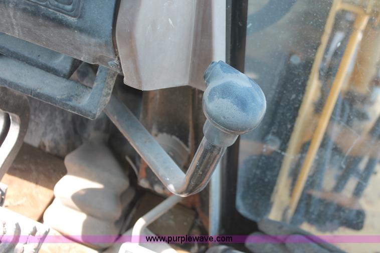 image for item I7989 1999 John Deere 310SE backhoe