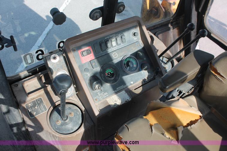 image for item I7989 1999 John Deere 310SE backhoe