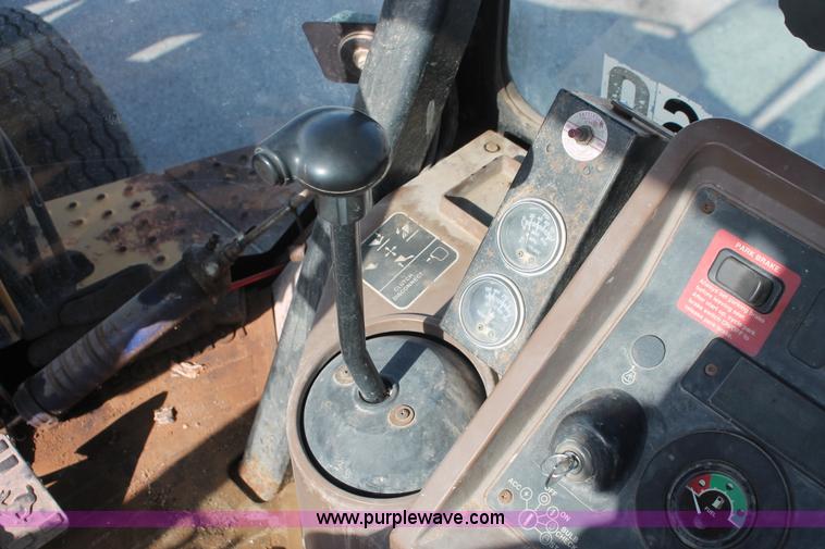 image for item I7989 1999 John Deere 310SE backhoe