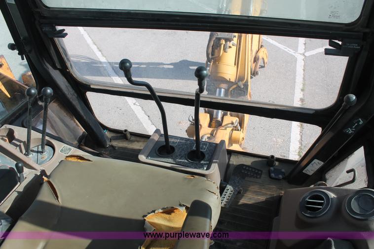 image for item I7989 1999 John Deere 310SE backhoe