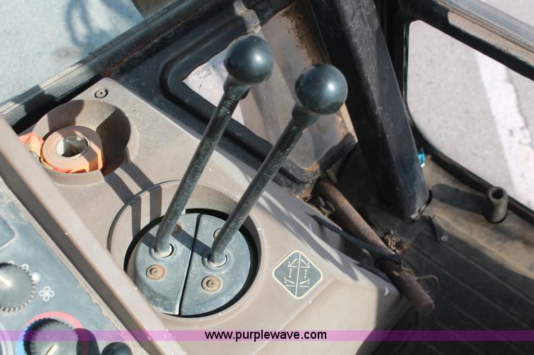 image for item I7989 1999 John Deere 310SE backhoe