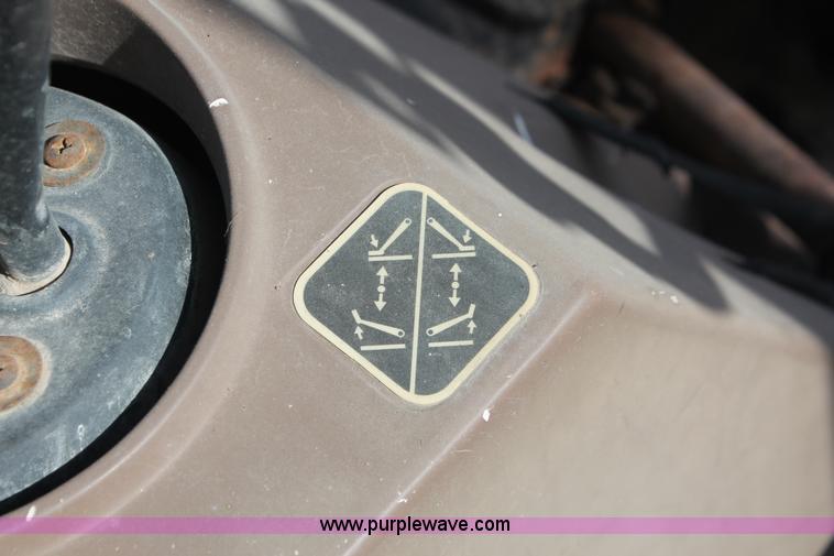 image for item I7989 1999 John Deere 310SE backhoe