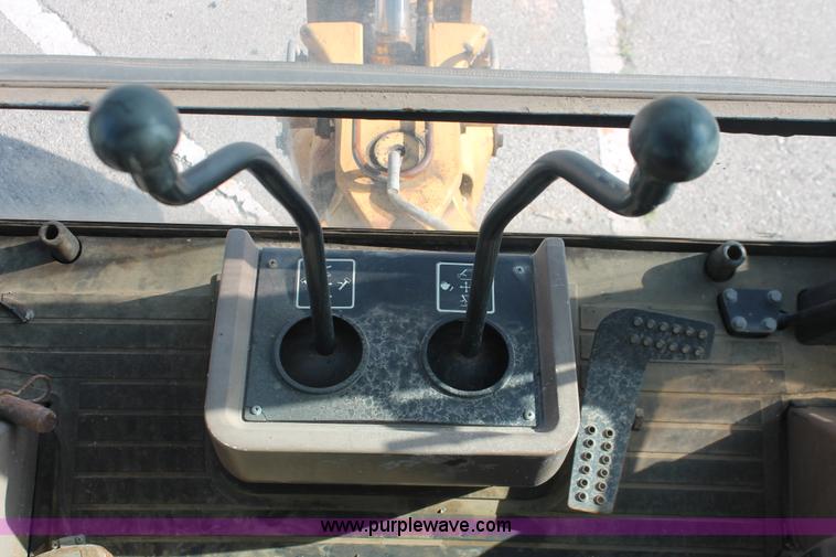 image for item I7989 1999 John Deere 310SE backhoe