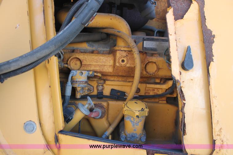 image for item I7989 1999 John Deere 310SE backhoe