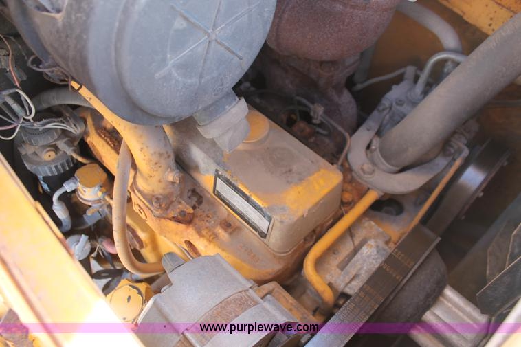 image for item I7989 1999 John Deere 310SE backhoe