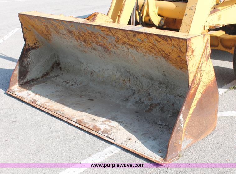 image for item I7989 1999 John Deere 310SE backhoe