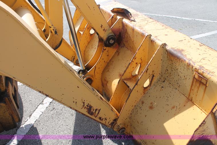 image for item I7989 1999 John Deere 310SE backhoe