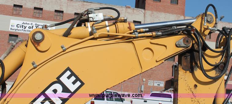 image for item I7989 1999 John Deere 310SE backhoe