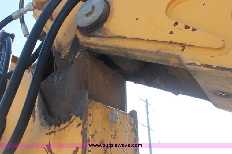 image for item I7989 1999 John Deere 310SE backhoe