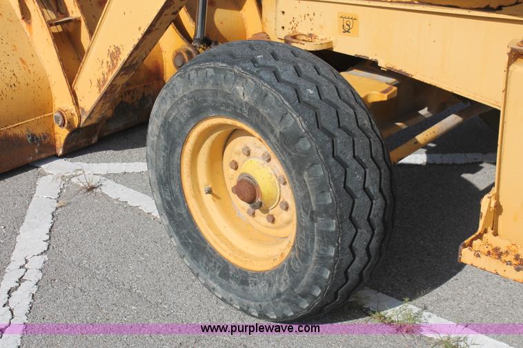 image for item I7989 1999 John Deere 310SE backhoe