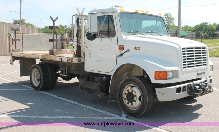 image for item I7994 1998 International 4700 low profile dump bed semi truck