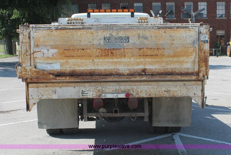 image for item I7994 1998 International 4700 low profile dump bed semi truck