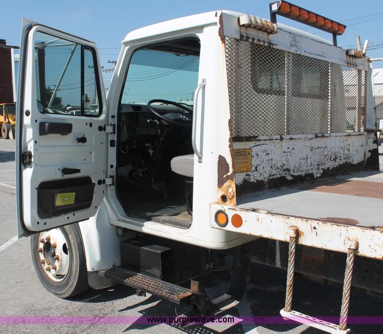 image for item I7994 1998 International 4700 low profile dump bed semi truck