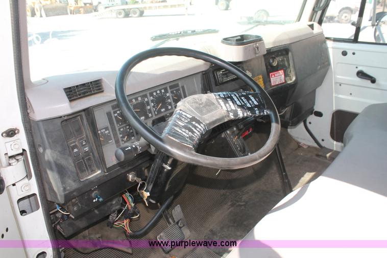 image for item I7994 1998 International 4700 low profile dump bed semi truck