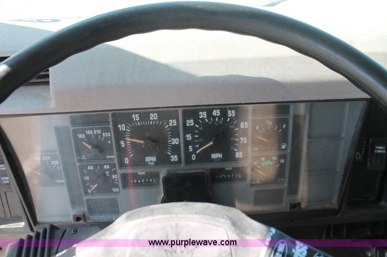 image for item I7994 1998 International 4700 low profile dump bed semi truck