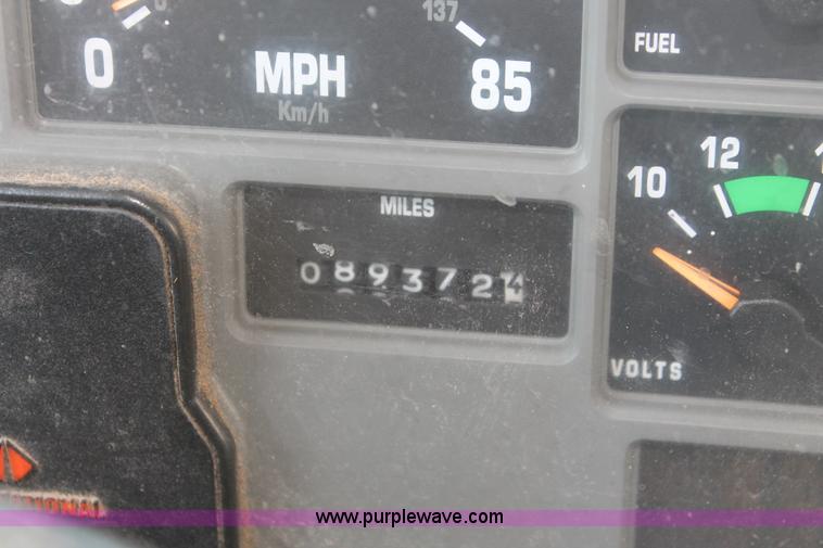 image for item I7994 1998 International 4700 low profile dump bed semi truck