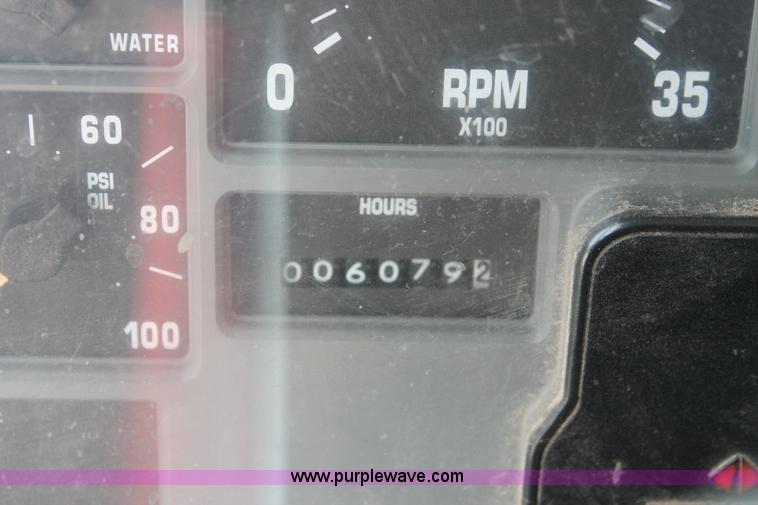 image for item I7994 1998 International 4700 low profile dump bed semi truck