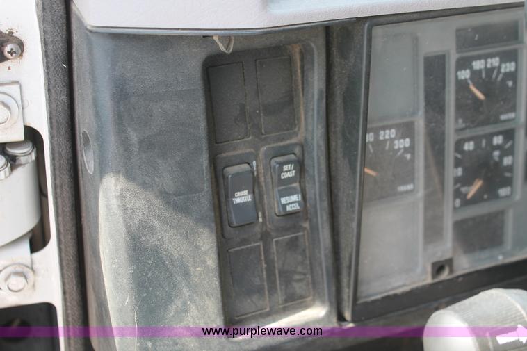 image for item I7994 1998 International 4700 low profile dump bed semi truck