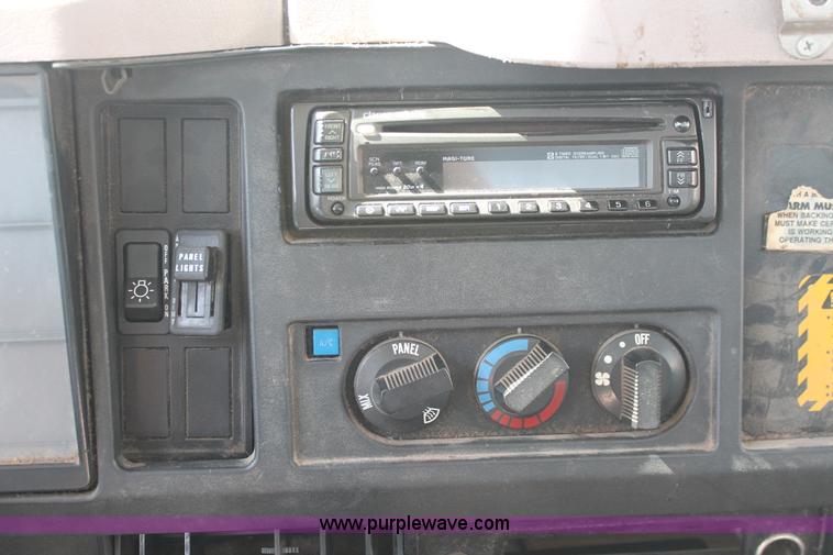 image for item I7994 1998 International 4700 low profile dump bed semi truck