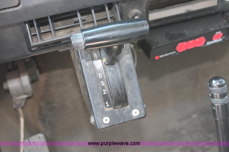 image for item I7994 1998 International 4700 low profile dump bed semi truck