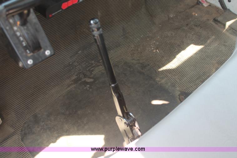 image for item I7994 1998 International 4700 low profile dump bed semi truck