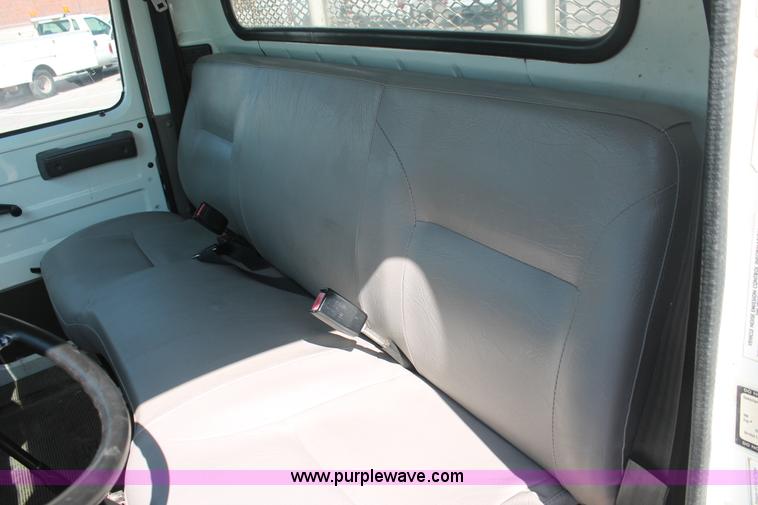 image for item I7994 1998 International 4700 low profile dump bed semi truck