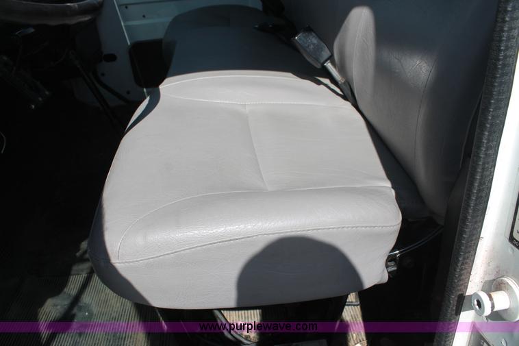 image for item I7994 1998 International 4700 low profile dump bed semi truck