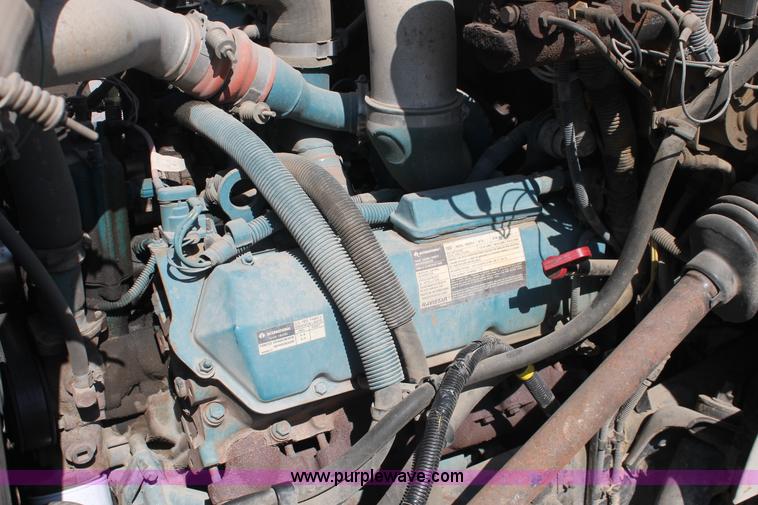 image for item I7994 1998 International 4700 low profile dump bed semi truck